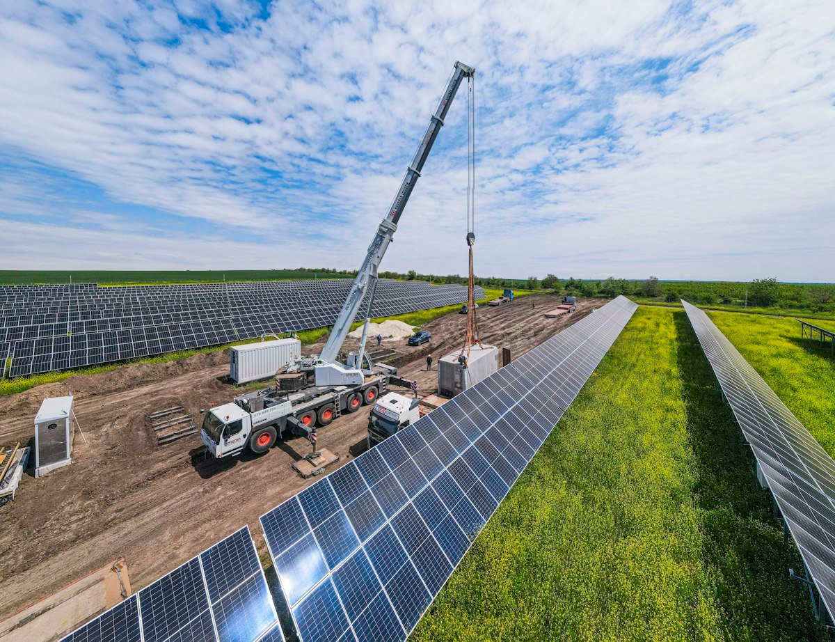 Crane working on a utility-scale solar plant